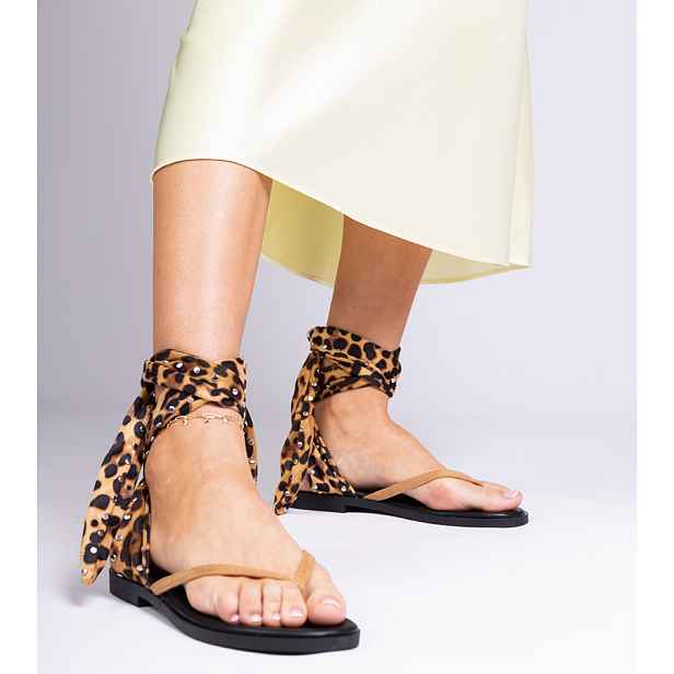Gemre Santrium leopard print thong sandals tied around the leg